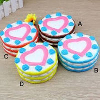 COLOSSAL HEART CAKE SQUISHY TOY