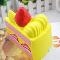 TRIANGLE CAKE SLICE SQUISHY TOY