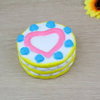 COLOSSAL HEART CAKE SQUISHY TOY